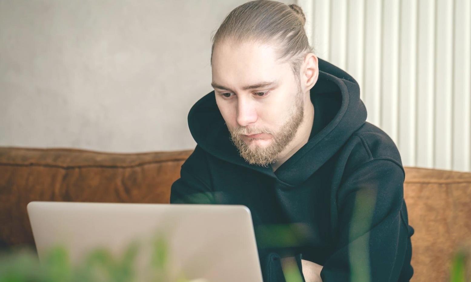 Development team reviewing blockchain code architecture and smart contract testing results